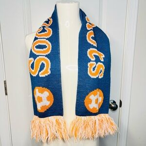 Soccer Shots reversible knitted orange and navy scarf
with Fringe